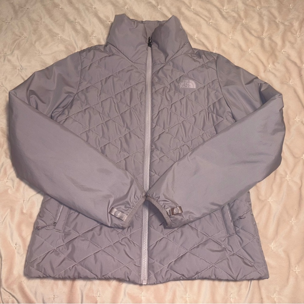 The North Face light purple lightweight Woman’s M puffer jacket with insulation.